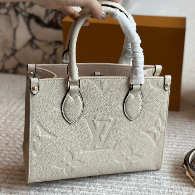 Louis Vuitton Onthego PM Cream Monogram 9.8 Inches