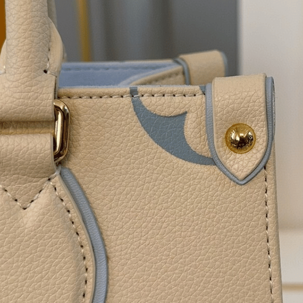 Louis Vuitton Onthego PM Monogram Empreinte Ivory Blue 9.8 Inches