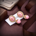 Gucci Interlocking Gg Pearl Earrings Pink