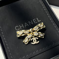 Chanel Cc Bowtie Brooch Gold
