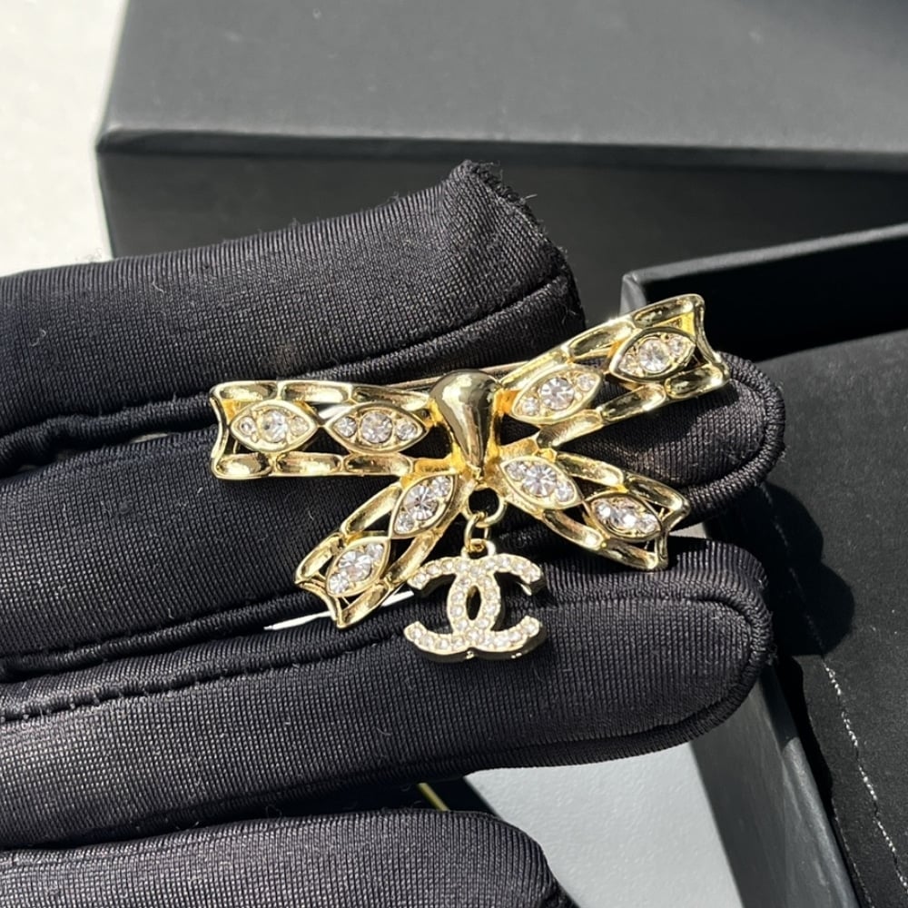 Chanel Cc Bowtie Brooch Gold