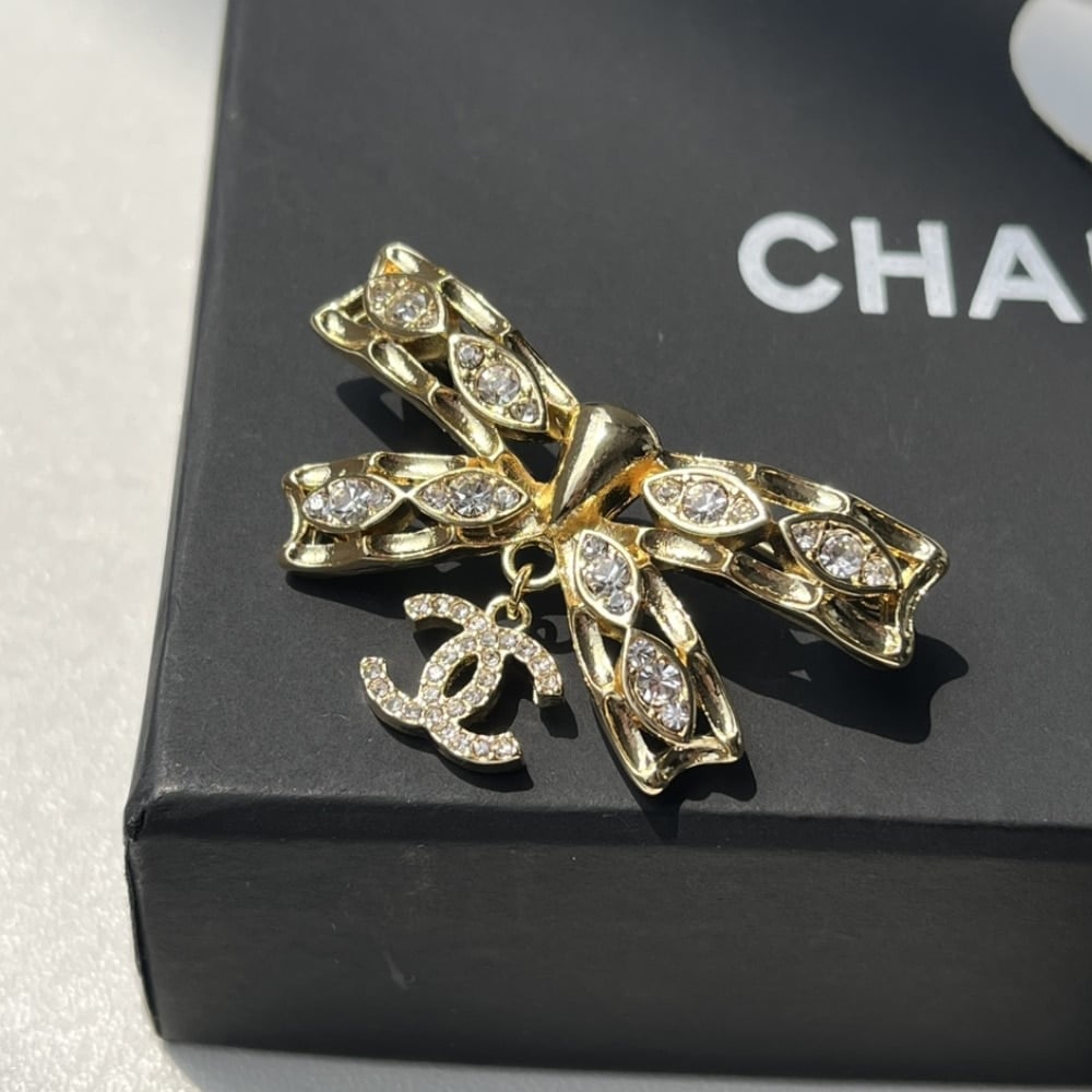 Chanel Cc Bowtie Brooch Gold