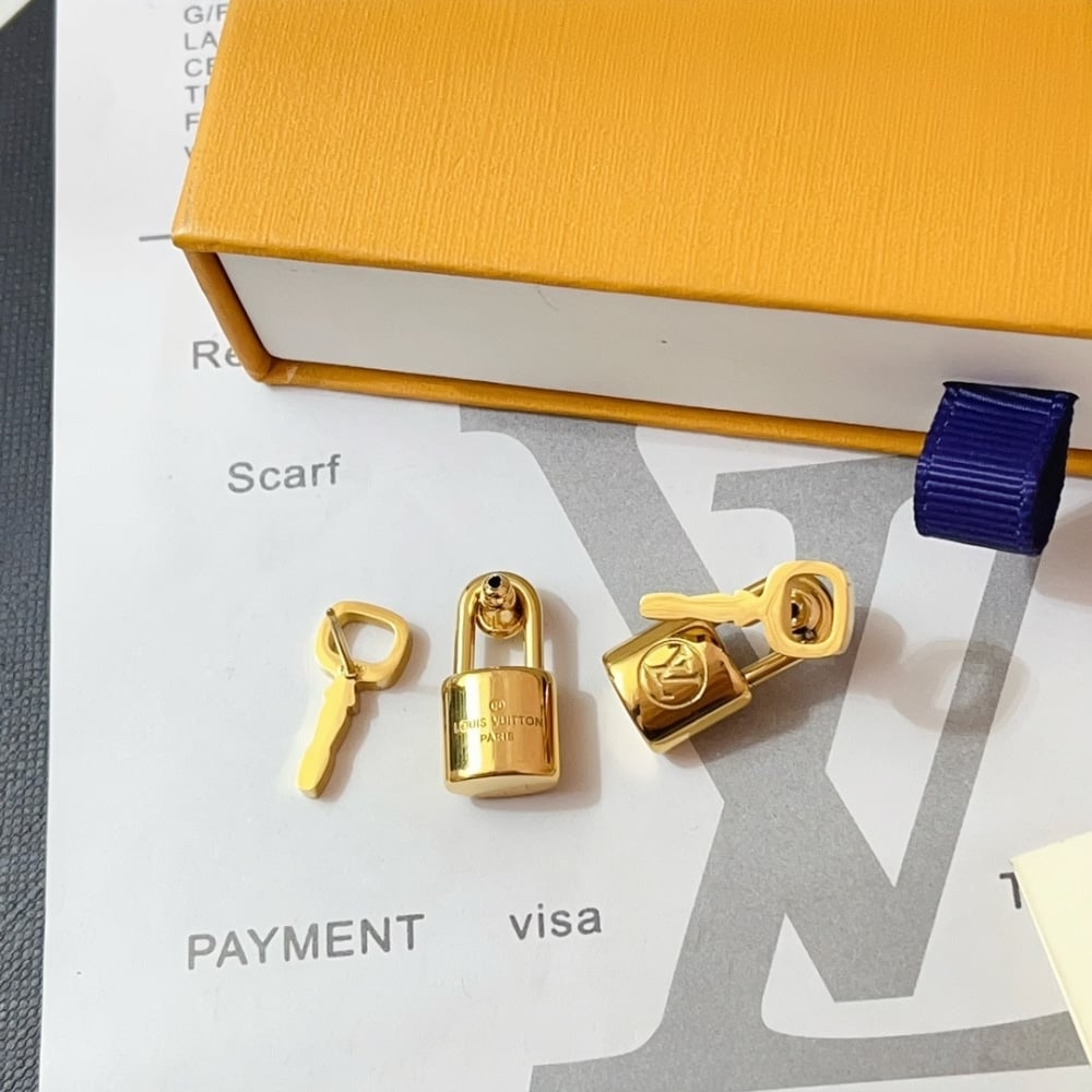 Louis Vuitton Lock It Earrings Gold