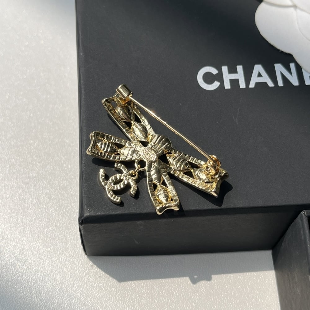 Chanel Cc Bowtie Brooch Gold