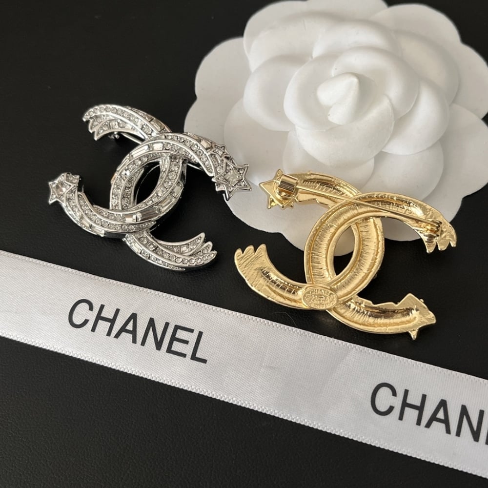 Chanel Cc Brooch Silver With Stones Attached And Two Stars
