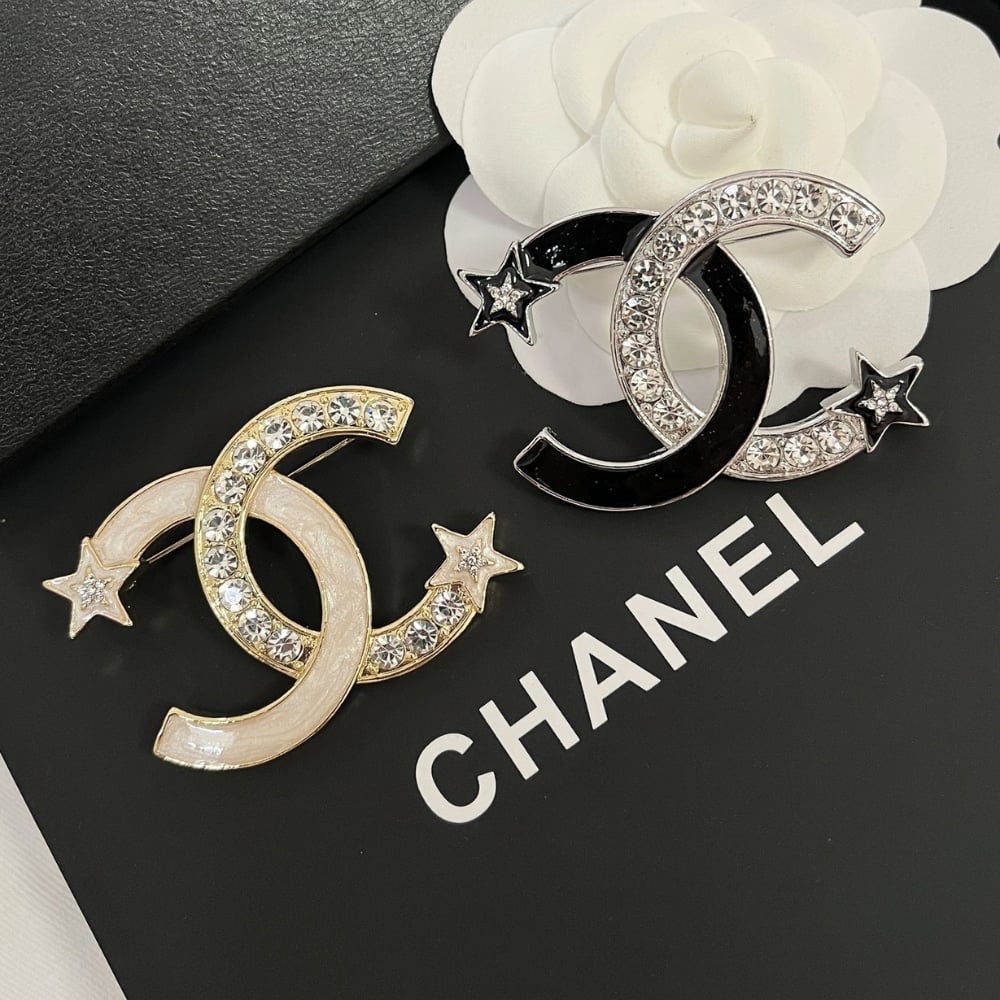 Chanel Cc Brooch Silver And Black With Two Small Stars