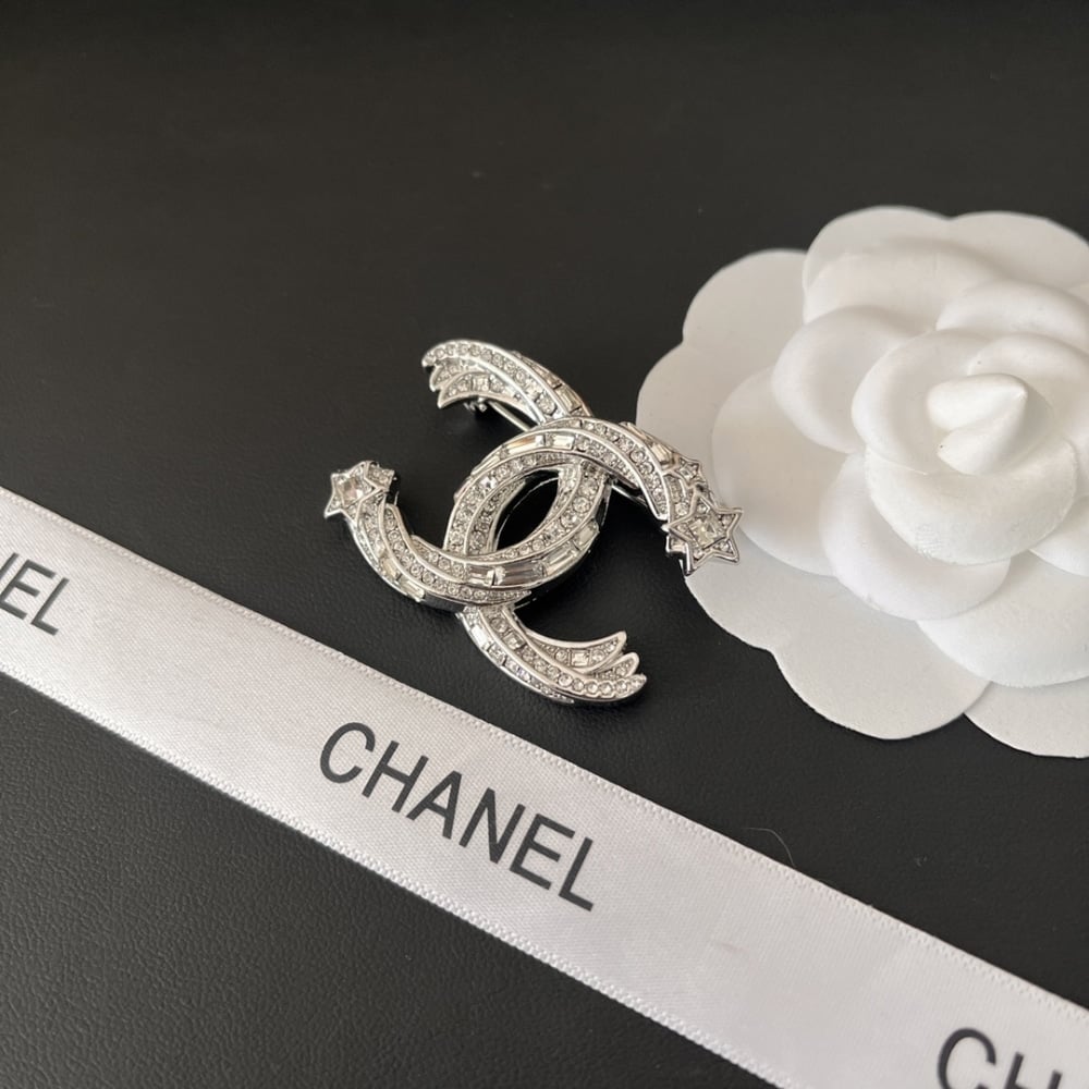 Chanel Cc Brooch Silver With Stones Attached And Two Stars
