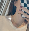 Chanel Logo Cc Necklace In Gold Metal And Silver Resin