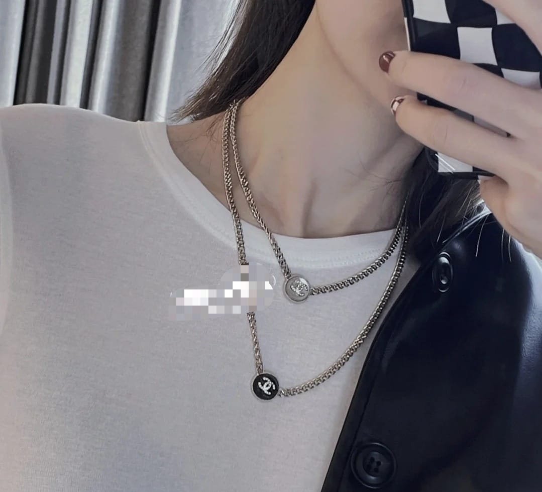 Chanel Logo Cc Necklace In Gold Metal Black Resin