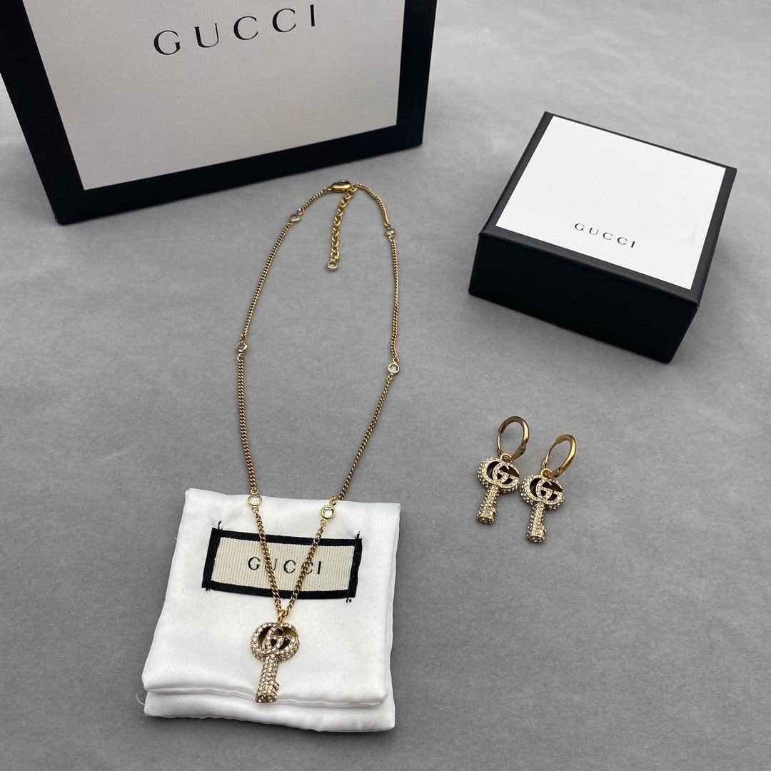 Gucci Gg Crystal Key In Gold Necklace
