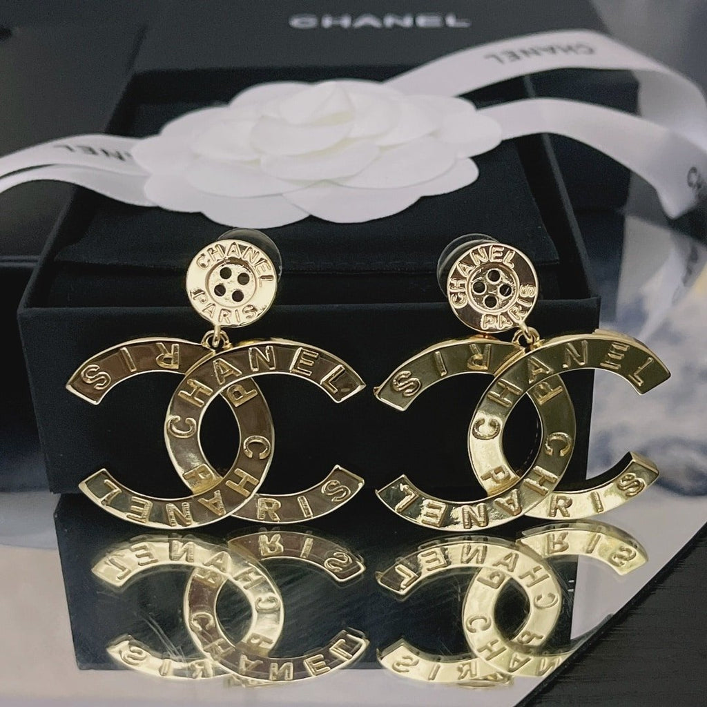 Chanel Paris Button Earrings