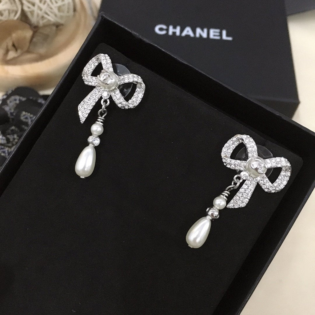 Chanel Bow Silver Pearl Earrings
