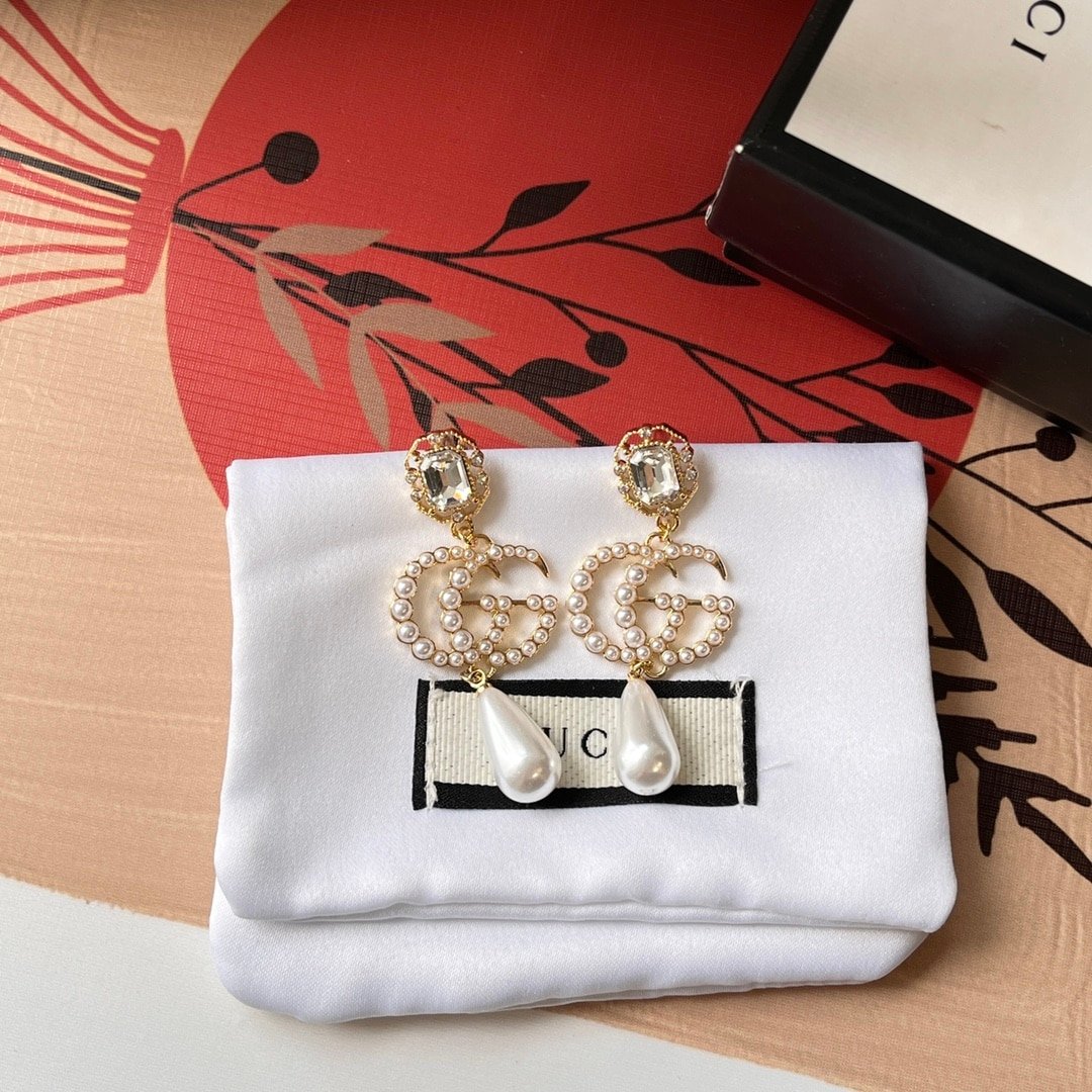 Gucci Pearl Gg Drop Earrings In Gold