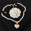 Chanel Cc Heart Pearl Necklace