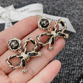 Chanel Metal Earrings Gold And Black