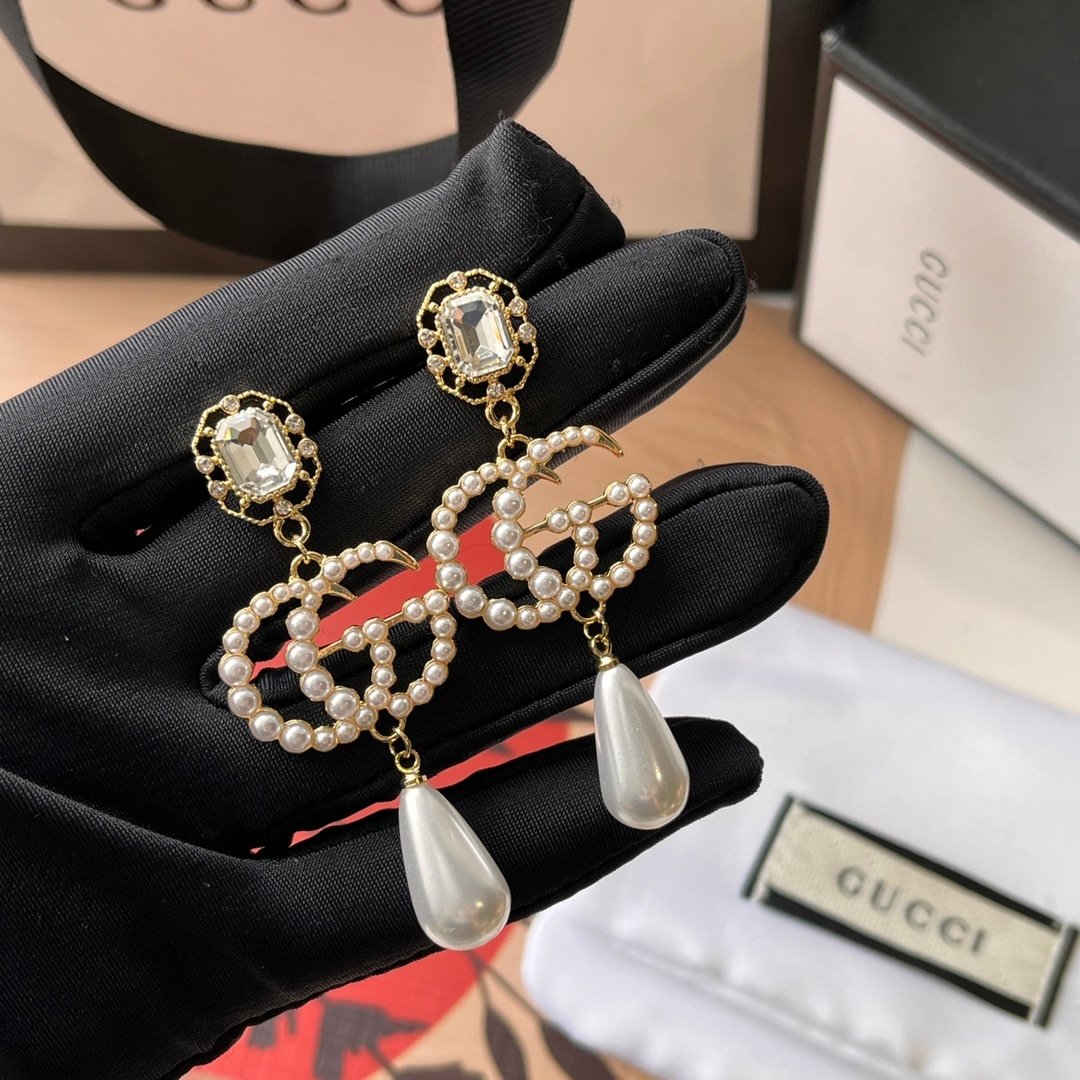 Gucci Pearl Gg Drop Earrings In Gold