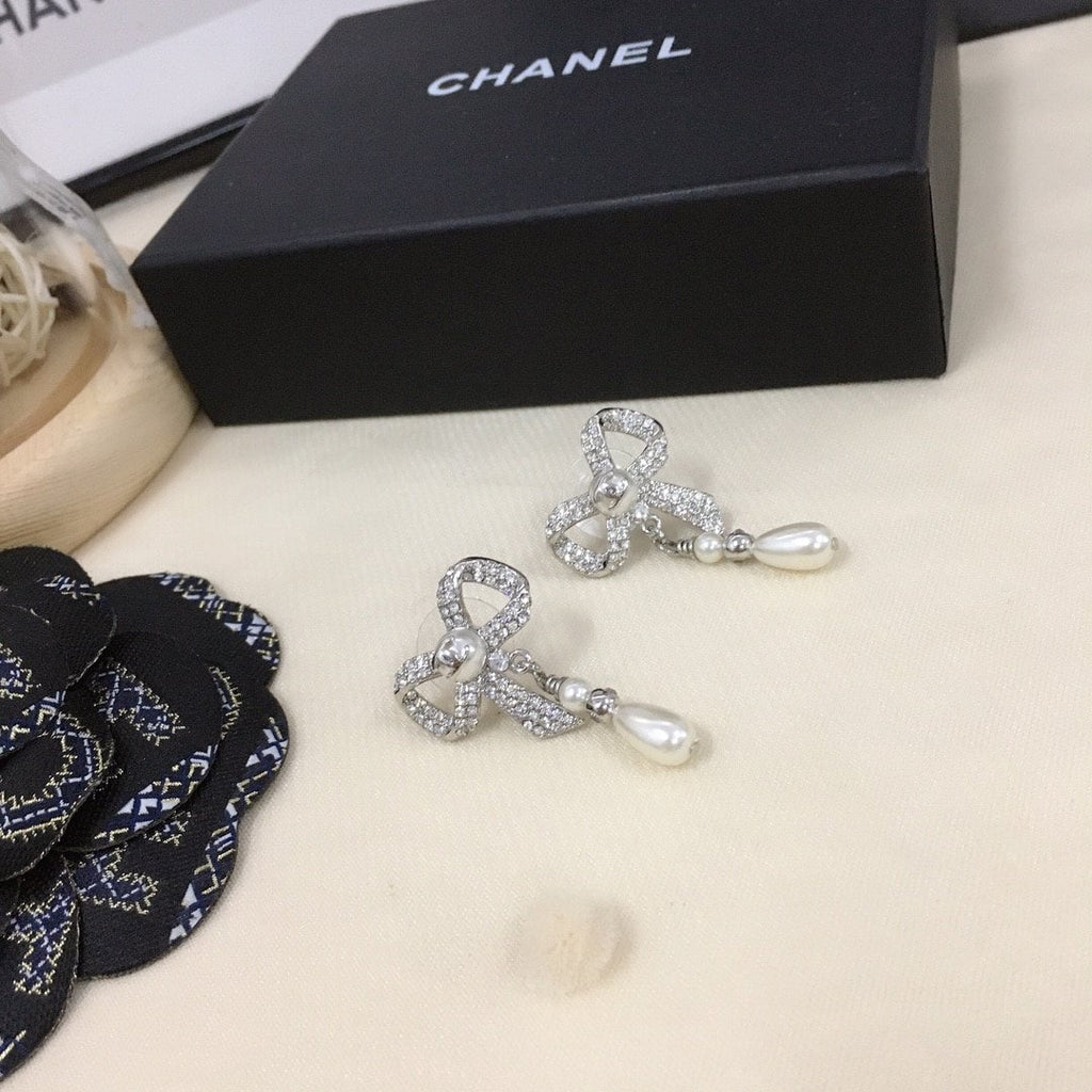 Chanel Bow Silver Pearl Earrings