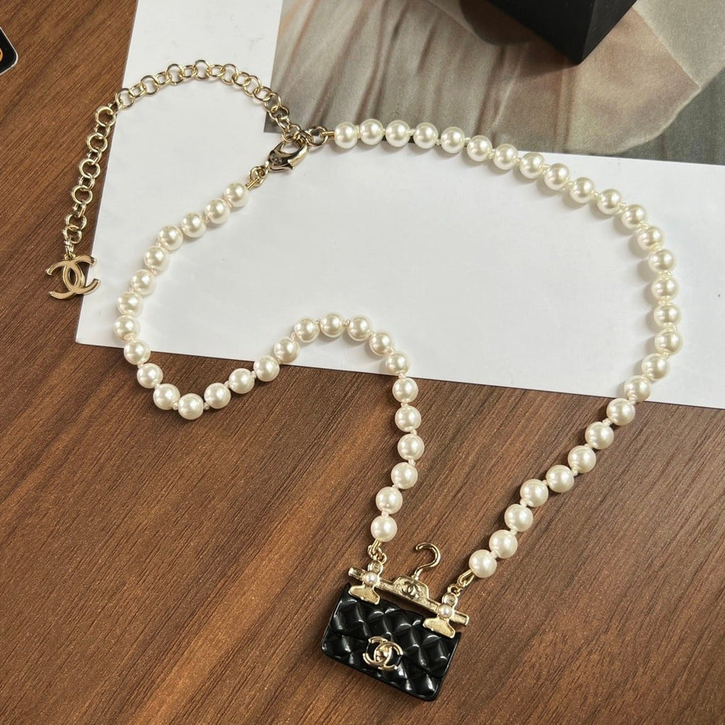 Chanel Pearl Metal Resin Quilted Flap Bag Necklace Gold