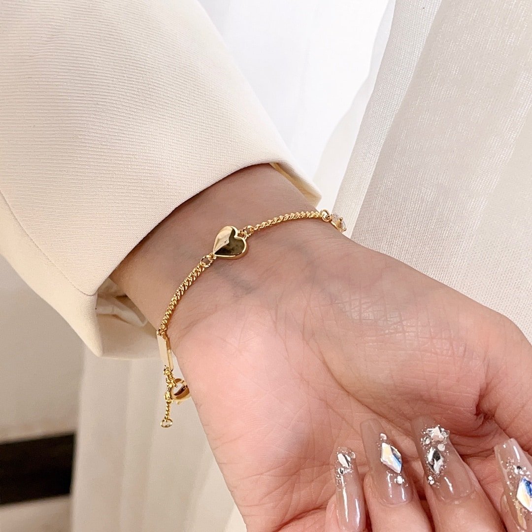 Saint Laurent Cassandre Heart Charm Bracelet Gold
