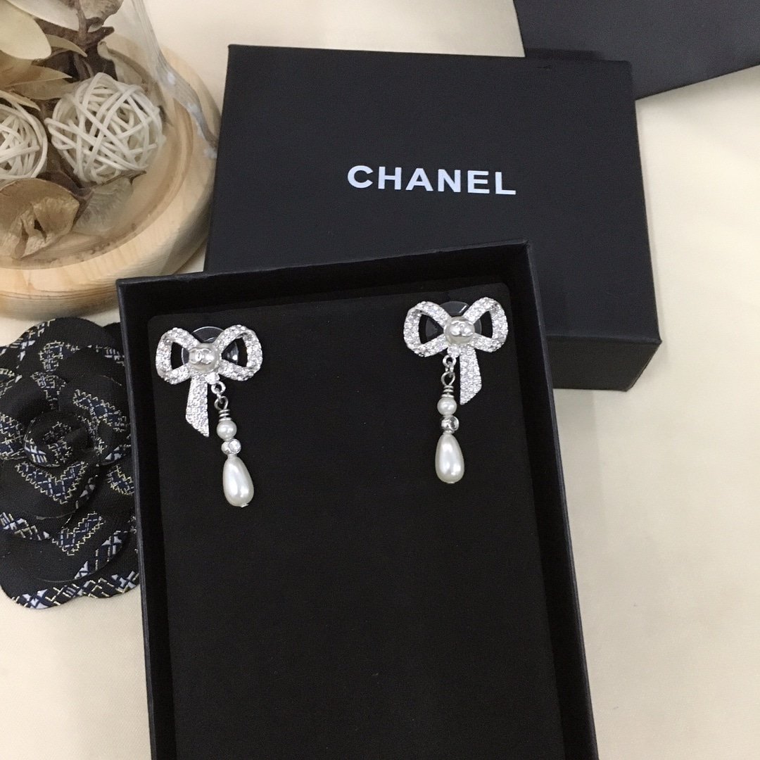 Chanel Bow Silver Pearl Earrings