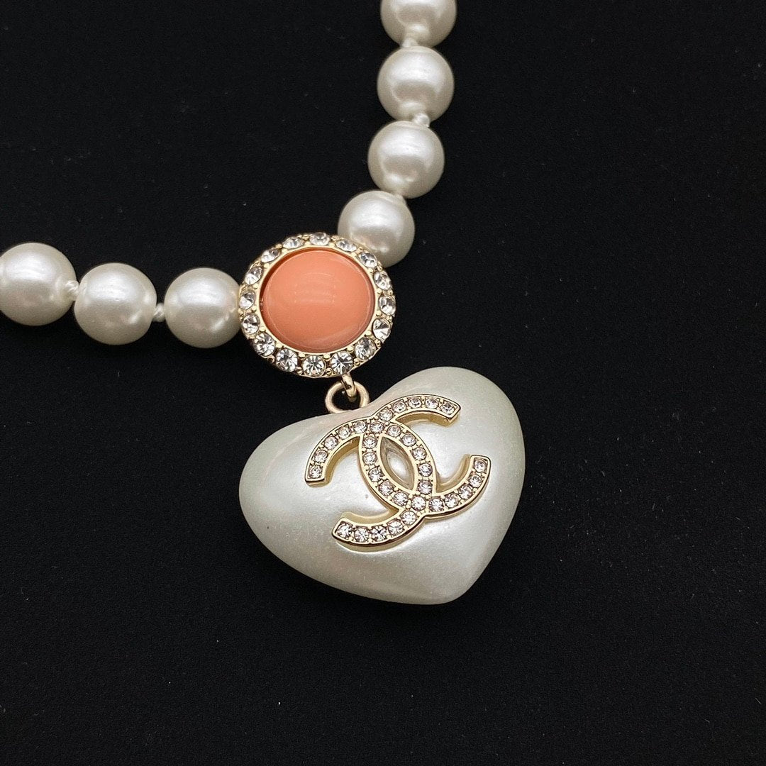 Chanel Cc Heart Pearl Necklace