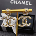 Chanel White Leather & Gold Metal Drop Earrings