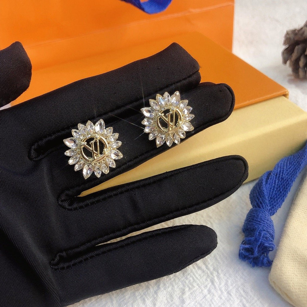 Louis Vuitton Sunburst Crystal Earrings Gold