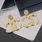 Chanel Paris Button Earrings