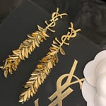 Saint Laurent YSL Leaf Tassel Gold Earrings
