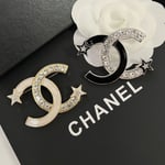 Chanel Cc Brooch Silver And Black With Two Small Stars