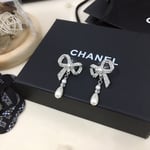 Chanel Bow Silver Pearl Earrings