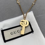 Gucci Gg Crystal Key In Gold Necklace