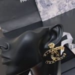 Chanel Paris Button Earrings