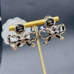 Chanel Metal Earrings Gold And Black