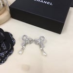 Chanel Bow Silver Pearl Earrings