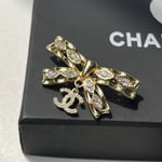 Chanel Cc Bowtie Brooch Gold