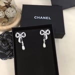 Chanel Bow Silver Pearl Earrings