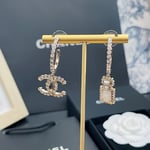 Chanel Cc And Perfume Bottle Hoop Earrings