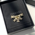 Chanel Cc Bowtie Brooch Gold