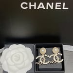 Chanel Earrings With White Pearls And Gold Metal