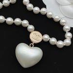 Chanel Cc Heart Pearl Necklace