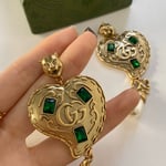 Gucci Gg Heart Earrings With Green Gems