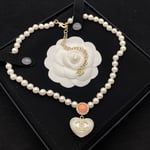 Chanel Cc Heart Pearl Necklace