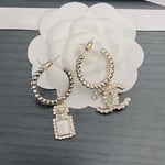 Chanel Cc And Perfume Bottle Hoop Earrings