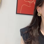 Louis Vuitton Compass Monogram Earrings Gold