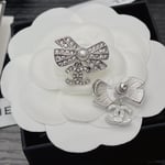 Chanel Crystal Cc Bow Drop Earrings Silver