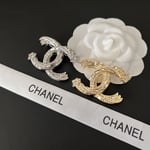 Chanel Cc Brooch Silver With Stones Attached And Two Stars