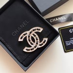 Chanel Cc Brooch White With Black Interwoven Chain Pattern