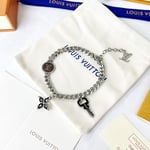 Louis Vuitton Monogram Lock Silver