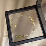 Saint Laurent Cassandre Charm Bracelet Gold